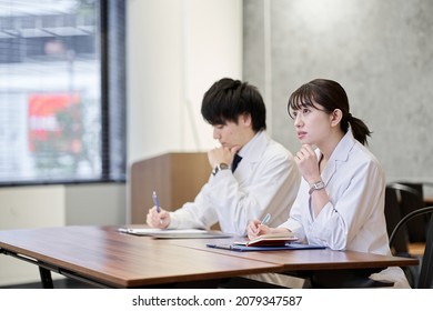 Asian Medical Personnel Listening To The Lecture