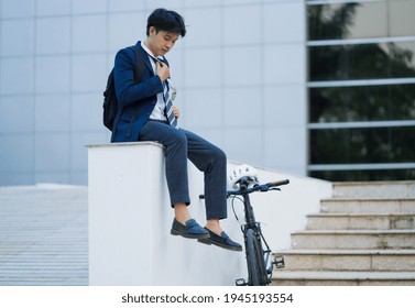 Asian Men Ride Bicycles To Work