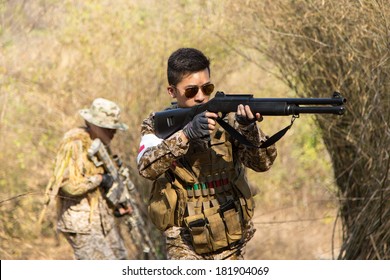 Asian Men Soldier Training Gun Tactic