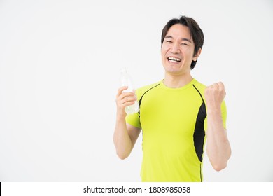 Asian Middle Age Man Who Drinks Water