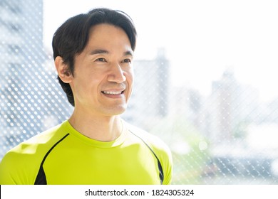 Asian Middle Age Man Who Plays Sports