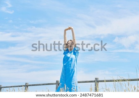 Asian middle aged woman relaxing outdoor