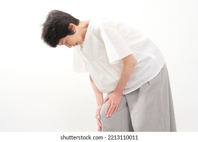 Asian Middle Aged Woman In White Background