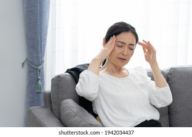 Asian Middle-aged Woman Who Is Sick