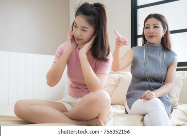 An Asian Mother Are Arguing With Her Teenager Daughter