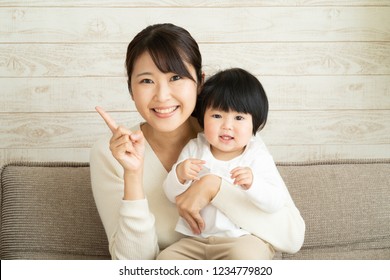 Asian  Mother And Baby