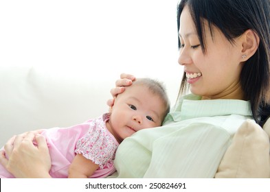 Asian Mother And Baby