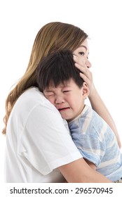 Asian Mother Comforting Her Crying Child On White Background Isolated