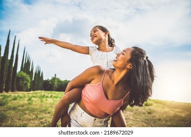 Asian Mother And Daughter Having Fun At The Park - Happy Family Playing Together Outside 