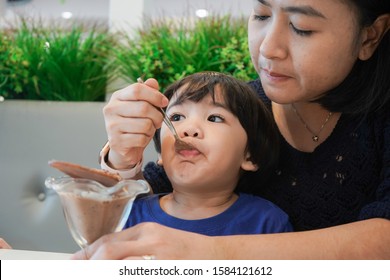 Asian Mother And Son Eating Ice Cream, Child Boy Eat Dessert