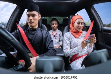 Asian Muslim Family Feeling Happy Inside The Car And The Husband Drive The Car To Their Village Hometown To Celebrate Eid Mubarak With Grandparents An Siblings 