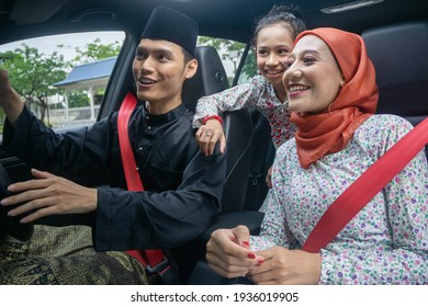 Asian Muslim Family Feeling Happy Inside The Car And The Husband Drive The Car To Their Village Hometown To Celebrate Eid Mubarak With Grandparents An Siblings 