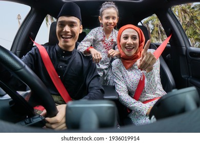 Asian Muslim Family Feeling Happy Inside The Car And The Husband Drive The Car To Their Village Hometown To Celebrate Eid Mubarak With Grandparents An Siblings 