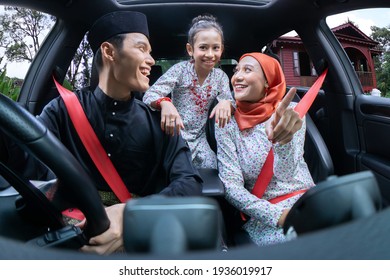 Asian Muslim Family Feeling Happy Inside The Car And The Husband Drive The Car To Their Village Hometown To Celebrate Eid Mubarak With Grandparents An Siblings 