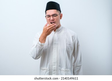 Asian Muslim Man Having Bad Breath Problem During Fasting In Ramadan Moth, Over White Background