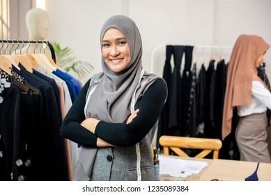 Asian Muslim Woman Designer As A Startup Business Owner In Her Tailor Shop