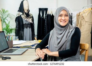 Asian Muslim Woman Designer As A Startup Business Owner In Her Tailor Shop