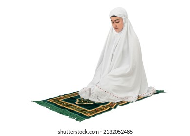 Asian Muslim Woman In Veil In Praying Position (salat) Isolated Over White Background