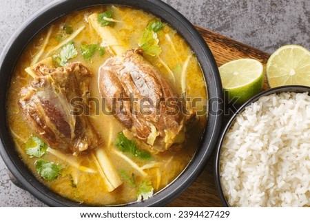 Asian Mutton Nalli Nihari Its a dish for lamb Lovers Spicy and healthy and tasty closeup on the wooden board on the table. Horizontal top view from above
