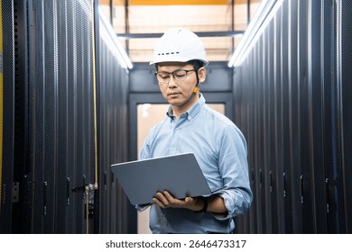  asian network engineer working in data center