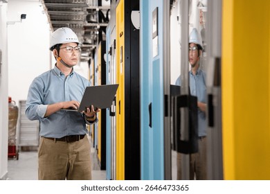  asian network engineer working in data center
