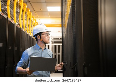  asian network engineer working in data center
