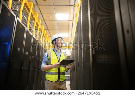 asian network engineer working in data center