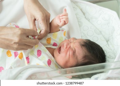 Asian Newborn Baby Is Crying When Mom Is Dressing Up