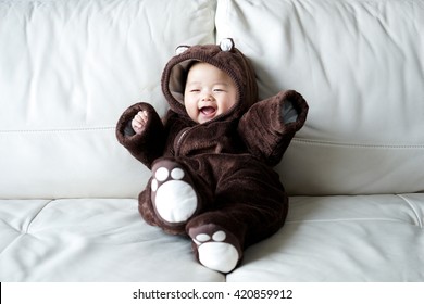 Asian Newborn Baby Wearing Bear Suit