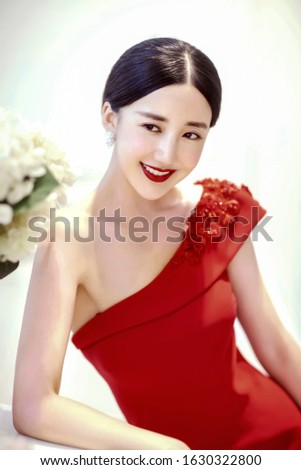 Asian noble red girl with gorgeous red lips