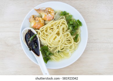 Asian noodles soup with shrimp and soy sauce.