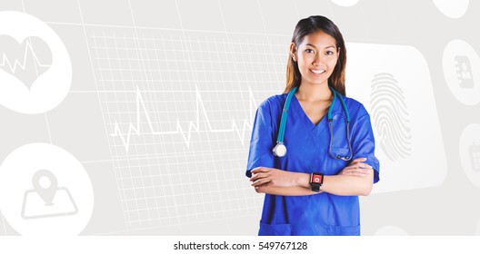 Asian nurse with stethoscope crossing arms against medical icons
