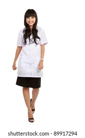 Asian Nurse Or Young Medical Doctor Walking Smiling In Full Length.