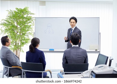 Asian Office Workers Having Meeting Office Stock Photo 1866974242 ...