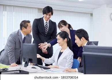 Asian Office Workers Working At The Office