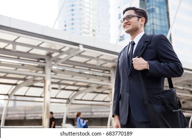 Asian Officer Getting Ready For Work