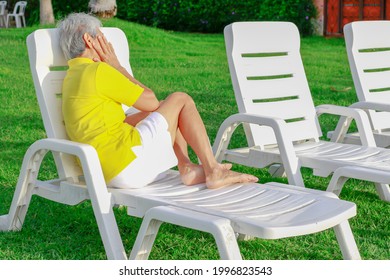 Asian Old Woman Take A Rest Lay On Chair At Beach. Senior Retirement Travel On Summer Vacation With Happy.