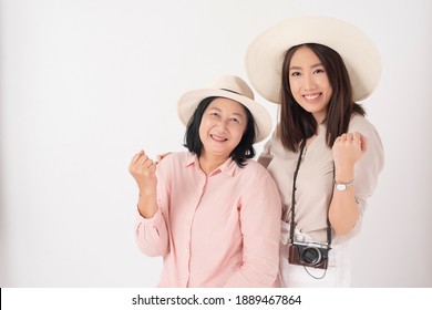 Asian Older Woman And Her Daughter On White Background, Travel Concept 