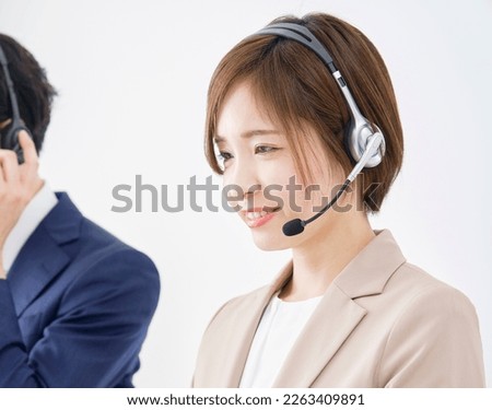 Asian operator working at the office