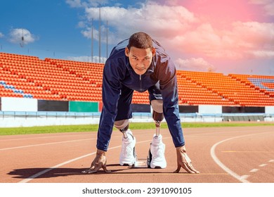 Asian para-athlete with prosthetic blades leg in stadium practicing workout for Paralympic running competition. Amputee sportsman runner practicing running workout. Disabled athlete man sport concept. - Powered by Shutterstock