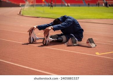 Asian para-athlete runner prosthetic leg on the track training alone outside on a stadium track Paralympic running concept. - Powered by Shutterstock