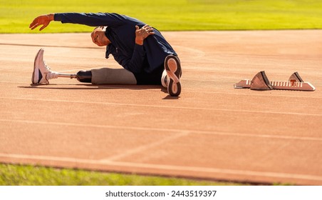 Asian para-athlete runner prosthetic leg on the track training alone outside on a stadium track Paralympic running concept. - Powered by Shutterstock