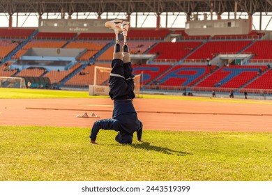 Asian para-athlete runner prosthetic leg on the track training alone outside on a stadium track Paralympic running concept. - Powered by Shutterstock