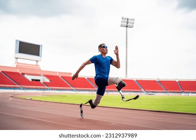 Asian para-athletes disabled with prosthetic blades running at stadium. Attractive amputee male runner exercise and practicing workout for Paralympics competition regardless of physical limitations. - Powered by Shutterstock