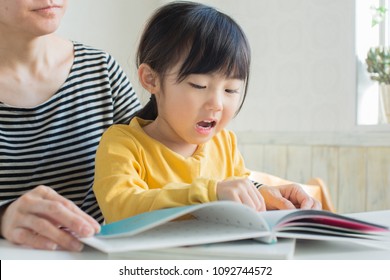 Asian Parent Reading Books