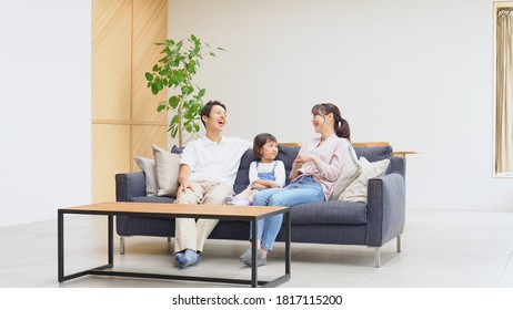 Asian parents talking with the daughter - Powered by Shutterstock