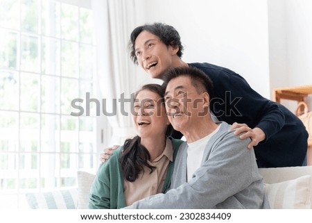 Asian parents and their son