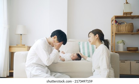 Asian Parents Worrying About Child Rearing.