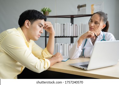 Asian Patient Man Consult Mental Health With Female Doctor