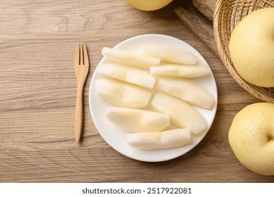 Asian pear fruit on plate ready to eating, Sweet and juicy fruit - Powered by Shutterstock